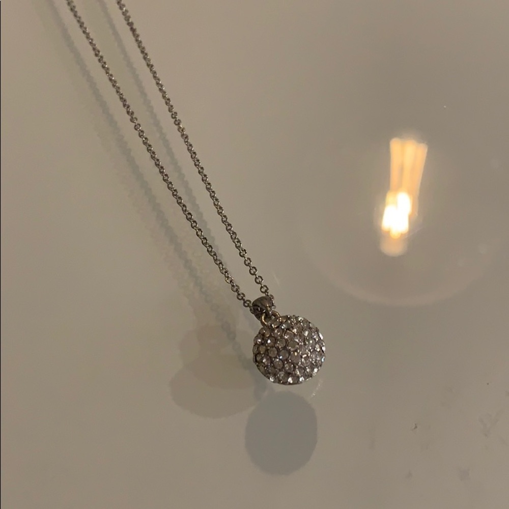 Necklace with sparkly ball pendant